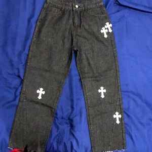 They are black pants which have white patches across the pants. Also never worn